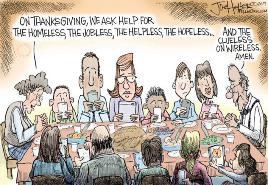 Une famille à Thanksgiving: "Le jour de Thanksgiving, nous demandons de l'aide pour les sans-abri, les sans-emploi, les désemparés, les désespérés... -Et les inconscients du sans fil.  Amen."