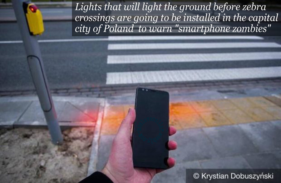 Des feux d'éclairage au sol devant les passages piétons vont être installés dans la capitale polonaise pour avertir les "zombies du smartphones."